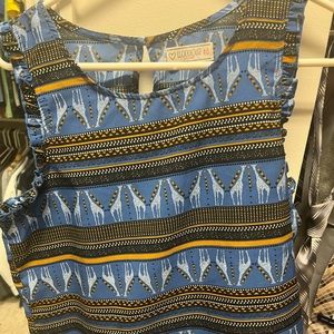 Sleeveless clockhouse top with ruffle sleeves